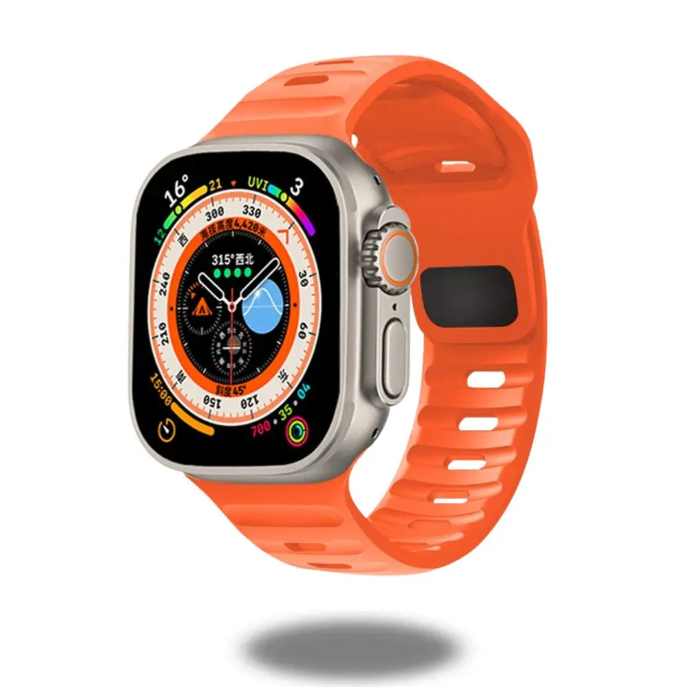 Rugged orange silicone sports band on Apple Watch, designed for adventure and active lifestyles.