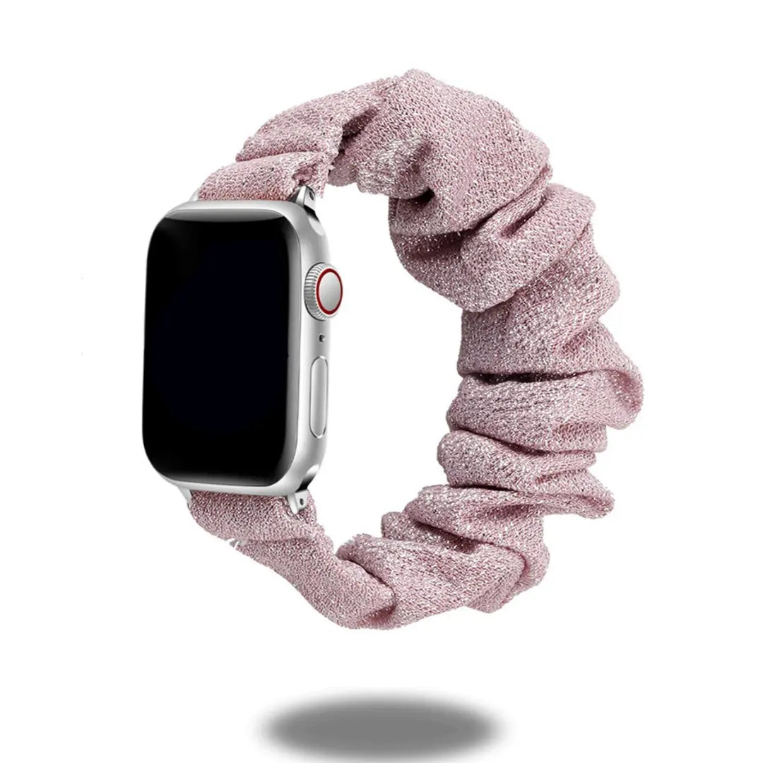 Comfortable and stylish scrunchie band for Apple Watch, perfect for daily wear in a soft pink hue.