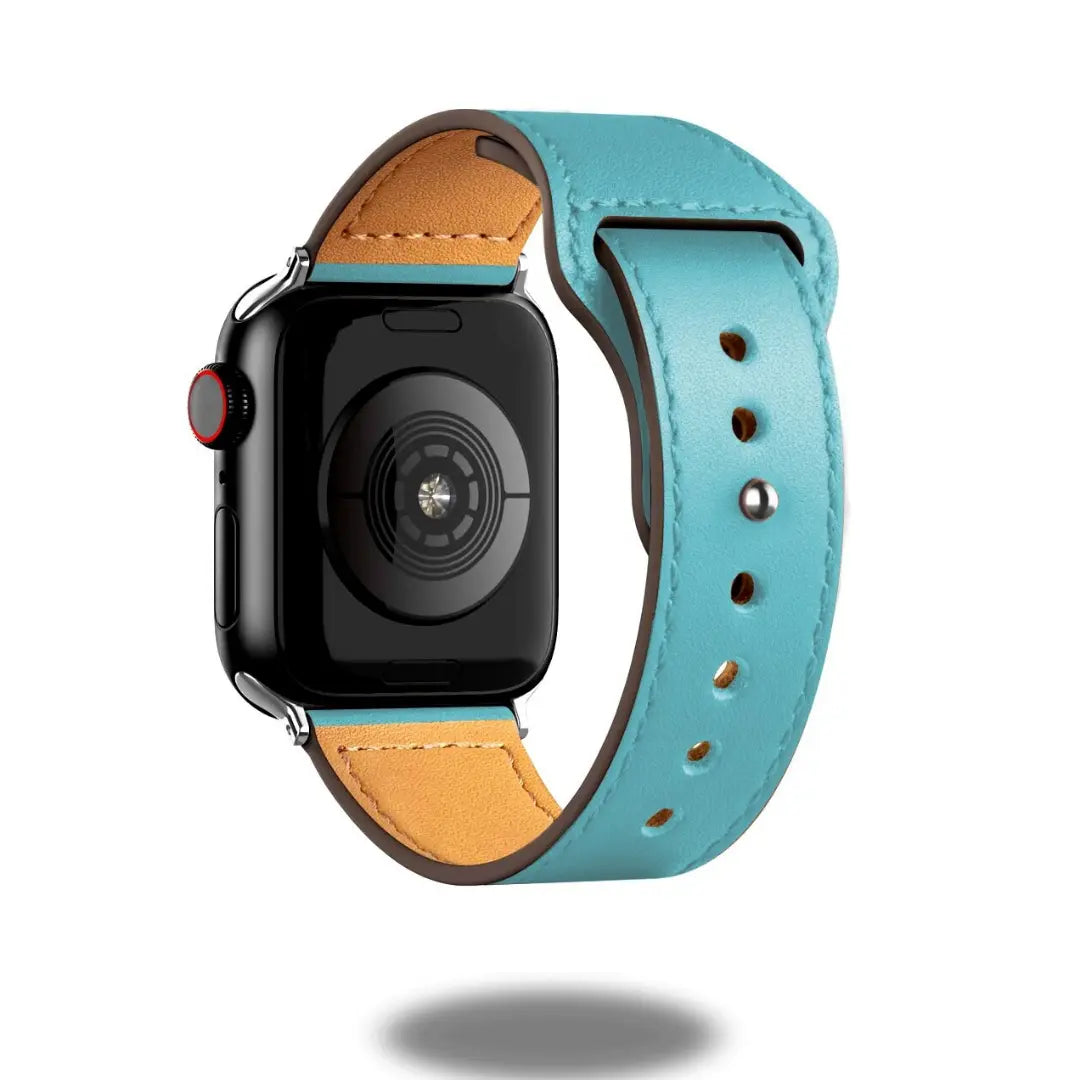 Stylish leather strap for Apple Watch in turquoise, offering elegance and comfort for daily wear.